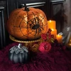 Kép 2/2 - Halloween-i tök dekoráció - narancs glitteres - pókhálóval - 15 cm