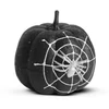 Kép 1/2 - Halloween-i tök dekoráció - fekete glitteres - pókhálóval - 15 cm