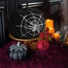 Kép 2/2 - Halloween-i tök dekoráció - fekete glitteres - pókhálóval - 15 cm