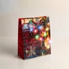 Kép 3/5 - Ajándéktasak - 10 színes LED, papír - 265 x 127 x 330 mm - 4 féle / csomag - 12 db / csomag