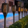 Kép 1/4 - LED-es szolár lámpa - leszúrható - lángeffekt - 12 sárga LED - műanyag - fekete - 10 x 58 cm