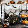 Kép 1/2 - Halloween-i tök dekoráció - 11 cm - fekete, pókkal - habszivacs