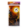 Kép 2/2 - Halloween-i asztalterítő - alumínium hatású - 137 x 183 cm - sírköves