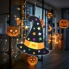Kép 1/2 - Halloween-i dekoráció - boszorkánykalap - akasztható - filc - 38 x 33 cm