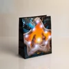 Kép 2/5 - Ajándéktasak - 10 hidegfehér LED, papír - 265 x 127 x 330 mm - 4 féle / csomag